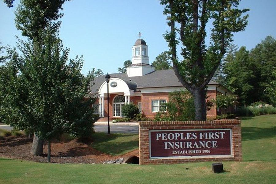 Contact Us - Peoples First Insurance Exterior of Building During Springtime